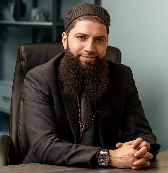 Hassan Shibly, Esq., at his desk